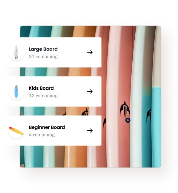 A rack of surfboards with three stock cards over it, each naming a board size and how many are left