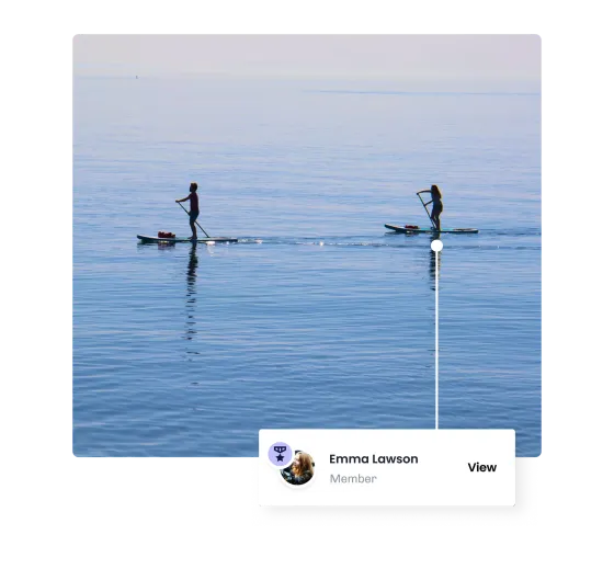 Two paddleboarders out on calm water, one flagged as a member with a link to their profile